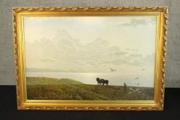 A framed landscape print showing a horse and plough. H.57 x W.82 cm.