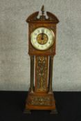 A Victorian miniature longcase clock with brass detailing and enamel dial. With key. H.46cm.