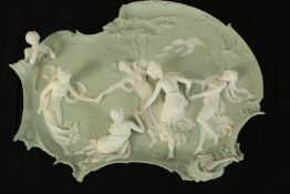 Decorative plaque showing dancing nymphs. In the style of Wedgewood but with no makers marks. H.24 x