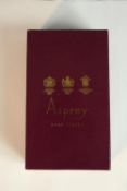 Two sets of ten silver plated Asprey & Co place card holders in the forms of apples and pears with