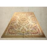 An Aubusson tapestry style carpet. L.280 W.181cm.