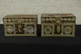 A pair of Indian teak and brass jewellery caskets. H.19 W.30cm. (each)