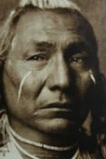 A framed photo portrait of a native American Indian. H.90 x W.73 cm.