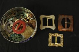 A large collection of decorative belt buckles.