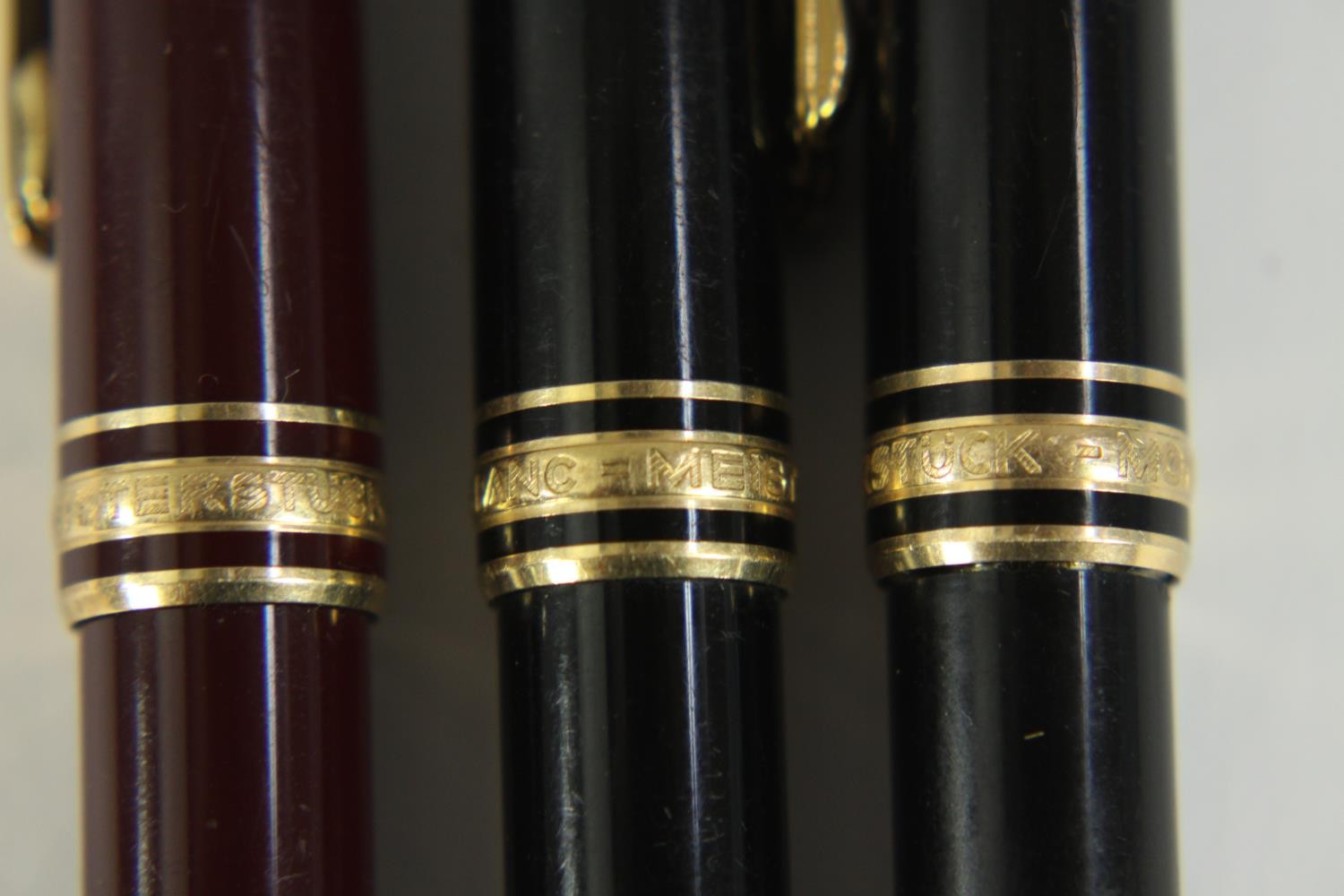 Three Mont Blanc Meisterstuck black lacquer ballpoint pens with gold plated detailing along with a - Image 7 of 7