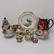 A collection of ceramics and porcelain, including various pieces of satsuma ware, a Minton's hand