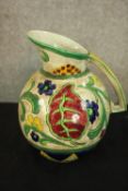 Sylvac Pottery. Jug with hand coloured floral decoration. Maker's mark on the base with signature of