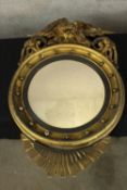 Wall mirror, Regency carved gilt wood with ebony slip. H.102 W.66cm.