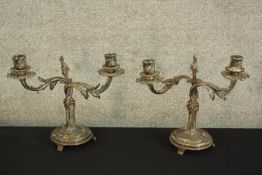 A pair of silver plated candelabras of naturalistic form. Each H.23 cm.