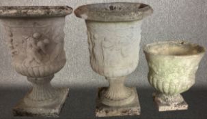 Three concrete planters decorated with reliefs of classical figures. Nicely aged and weathered.