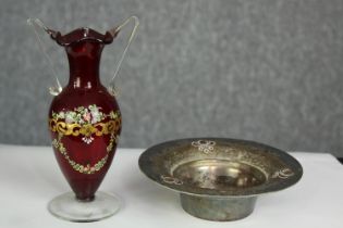 A small Arts and Crafts silver plated dish and a double handled red glass vase. The vase H. 16 cm.