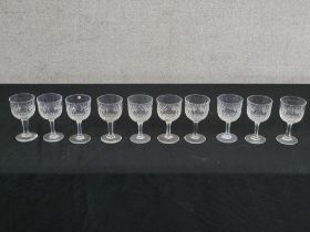 Ten Thomas Webb cut glass wine glasses, the tapering stem raised on circular foot, etched marks to