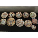 A mixed collection of decorative Chinese plates. Hand painted and with the artists seals on the