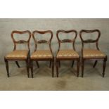 Dining chairs, a set of four mid 19th century rosewood with newly covered drop in seats.