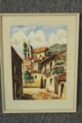 Watercolour. A village scene probably French or Spanish. Signed indistinctly bottom right. Framed