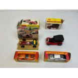 A collection of four Dinky toys cars including ‘Whizzwheels’ and the Lotus F1 Racing Car.