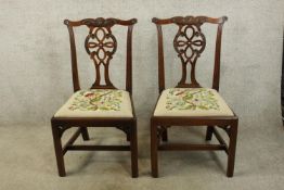 Dining chairs, Georgian Chippendale style mahogany with drop in tapestry seats.