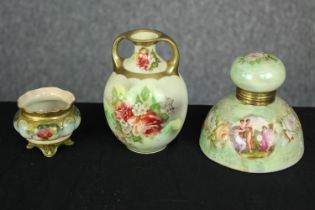 Three 19th century gilt and painted ceramic pots. The largest measures H.12 cm.