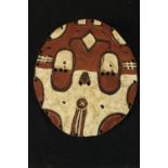 A polychrome Kidumu Teke West Africa mask. H.35 x W.30cm.