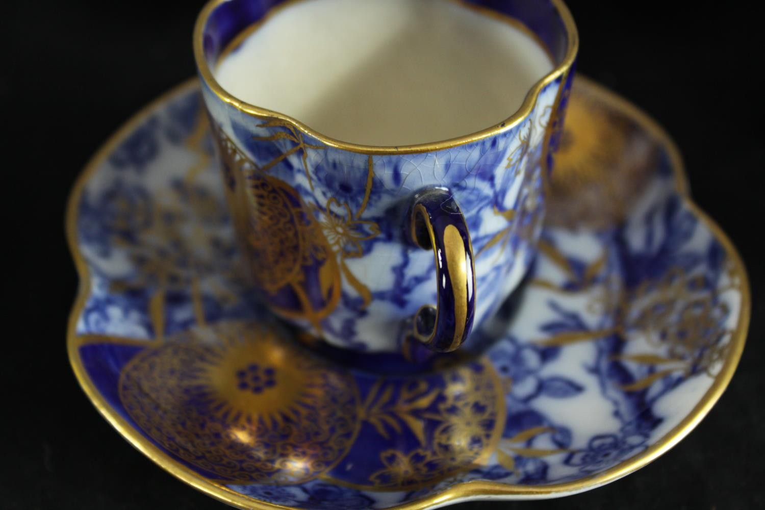 A collection of porcelain plates and cups. A varied mix of ages and styles. Includes a bulb bowl. - Image 5 of 11