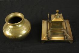 A 19th century brass desk inkwell and an incised brass open necked jar. H.14 W.15cm. (largest)
