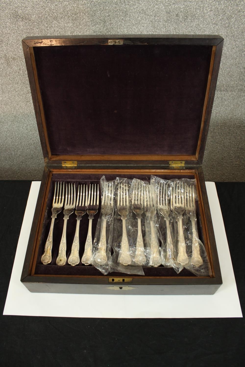 A case of fish knives and forks. A double tray of kings pattern cutlery. The box is decorated with a - Image 2 of 7