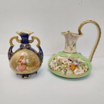 A 19th century jug with hand painted floral design along with a twin handled vase with figural