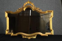 Wall mirror, carved gilt wood, Continental style. H.74 W.90cm.