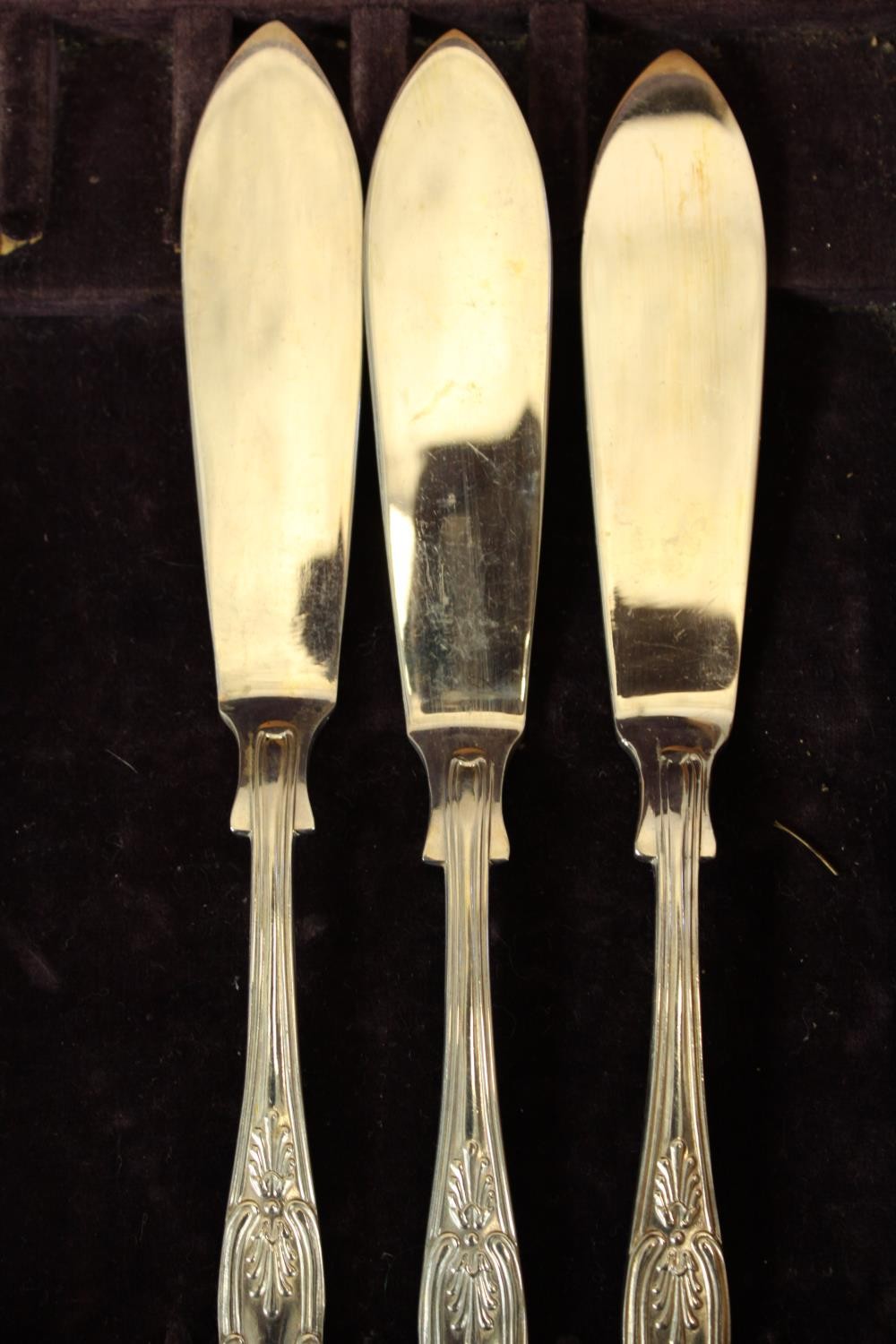 A case of fish knives and forks. A double tray of kings pattern cutlery. The box is decorated with a - Image 6 of 7