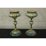 Royal Doulton. Two enamelled ceramic candle holders. Marked 'Clarkes' on the base. Circa 1900 but