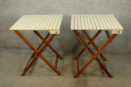 Cafe tables, a pair, folding vintage style. H.74 W.60cm. (each) (Damage to one as shown).