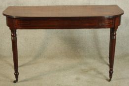 Console table, early 19th century mahogany with ebony inlay. H.72 W.122 cm.