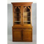 Library bookcase, late 19th century oak Gothic style, in two sections. H.244 W.130cm.