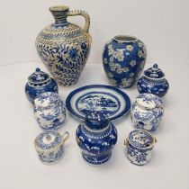 A collection of blue and white ceramics, including three Chinese blue and white prunus design ginger