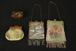 Three purses and a box. Two sequined and one silk. The lacquered wooden box is fastened with a small