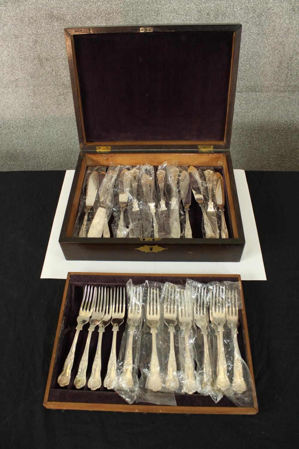 A case of fish knives and forks. A double tray of kings pattern cutlery. The box is decorated with a - Image 3 of 7