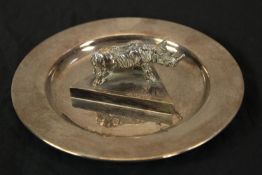 Carrington & Co. Silver plated Rhino set on a dish with a diameter of 17cm.