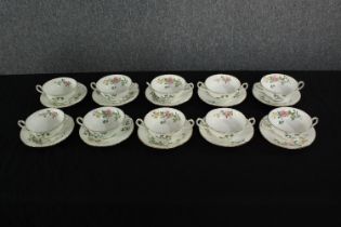 A set of Mintons bowls and saucers. With a floral design and double handles. Each with a diameter of