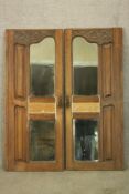 Two mirrored wardrobe doors, late 19th century walnut. H.138 W.55cm (each).