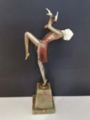 After Josef Lorenzl (Austrian, 1892-1950), an Art Deco painted bronze and ivory sculpture of