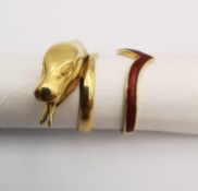 Two 18ct yellow gold rings, one carved in the form of a coiled snake and the other a V-shaped band