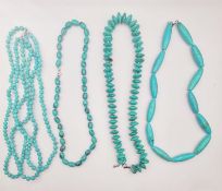 Four 20th century knotted turquoise bead necklaces with silver clasps, including a multi strand