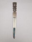 A Polish silver wirework pierced design letter opener by ORNO. Stamped with makers mark and polish