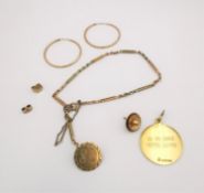 A collection of gold jewellery, including a pair of pink metal (tests as 9ct) gold hoop earrings,