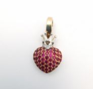 A Theo Fennell 18ct rose and white gold ruby and diamond heart with crown 'ART' small pendant. The