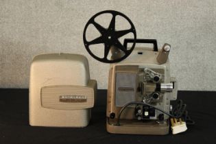 A mid 20th century boxed Bell & Howell electronic projector. H.37 W.33 D.30cm. (box)