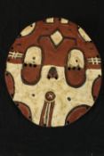 A polychrome Kidumu Teke West Africa mask. H.35 x W.30cm.