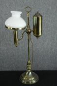 A Victorian brass students lamp converted for electricity. H.50 cm.