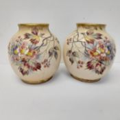A pair of Royal Bonn hand painted ceramic vases with flower blossom decoration. Makers stamp to