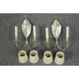 A pair of silver coloured wall lights with matching shades. Each measuring H.33 x W.25 cm.